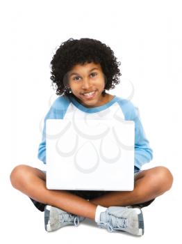 Boy using internet and smiling isolated over white