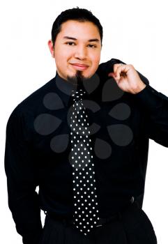 Close-up of a businessman posing and smiling isolated over white