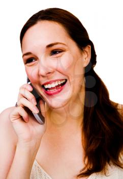 Gorgeous woman talking on a mobile phone isolated over white