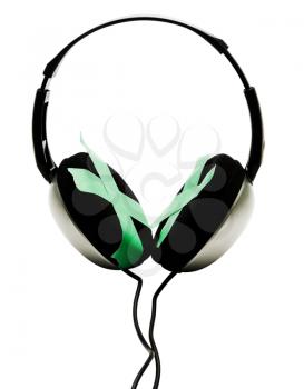 Adhesive tape on headphones isolated over white