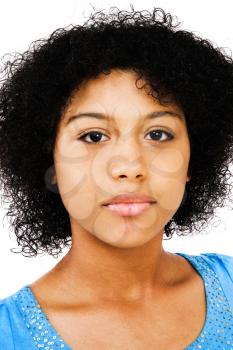 Mixed race teenage girl thinking and posing isolated over white