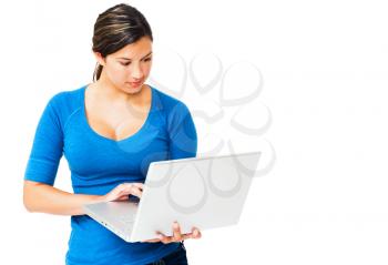 Caucasian woman working on a laptop isolated over white