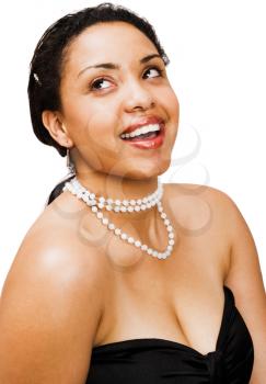 Hispanic young woman posing and smiling isolated over white