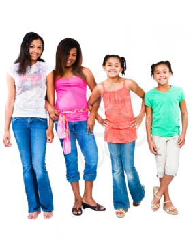 Girls standing with teenage girls and smiling isolated over white