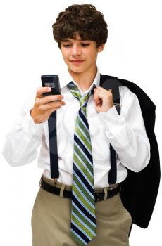 Smiling boy text messaging on a mobile phone isolated over white