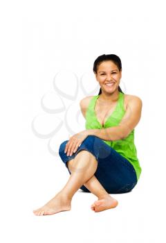 Mixed race woman sitting and smiling isolated over white