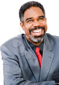 African American businessman posing and laughing isolated over white