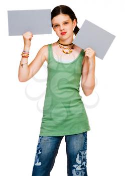 Smiling girl showing placards and posing isolated over white