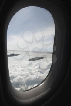 Clouds viewed through the window of an airplane, New Delhi, India