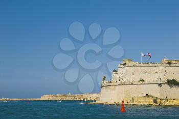 Buoy floating in water, Fort St. Angelo, Vittoriosa, Malta