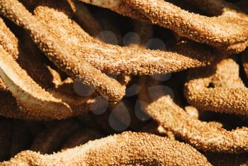 Close-up of koulouri the traditional Greek breads at a market stall, Athens, Greece