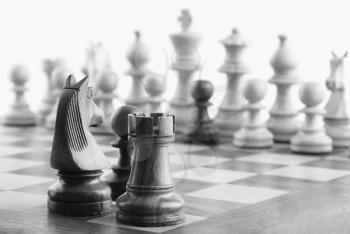 Close-up of chess pieces on a chessboard