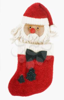Close-up of a of Santa Claus toy in Christmas stocking