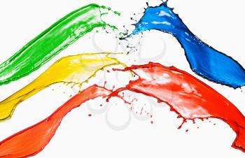 Splash of different color paints on a white background