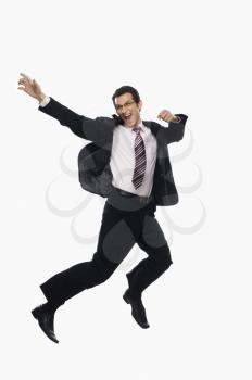 Businessman jumping