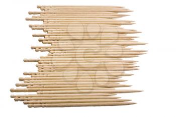Close-up of toothpicks in a row