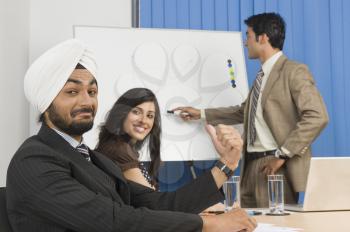 Businessman giving presentation in a conference room