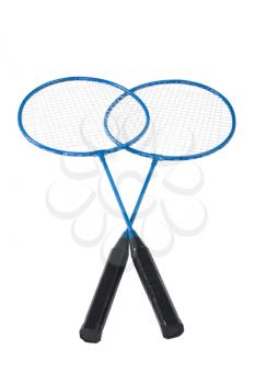 Close-up of two badminton rackets