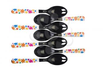 Plastic spoons in a row