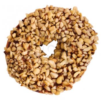 Close-up of a donut garnished with nuts