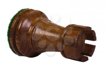 Close-up of a fallen rook chess piece