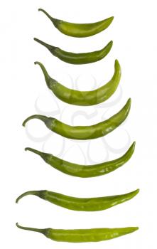 Close-up of green chili peppers arranged in a row