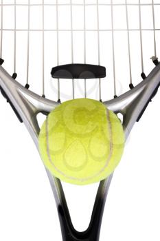 Close-up of a tennis racket with a tennis ball