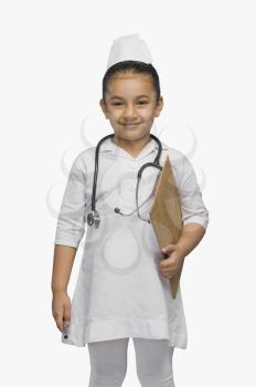 Girl dressed as a nurse and smiling
