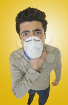 Businessman wearing pollution mask