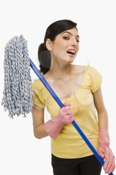 Woman holding a mop