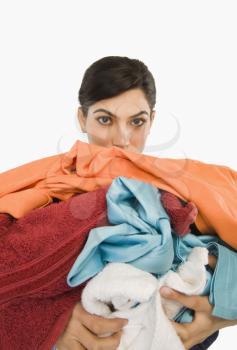 Woman holding clothes