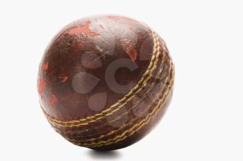 Close-up of an old cricket ball