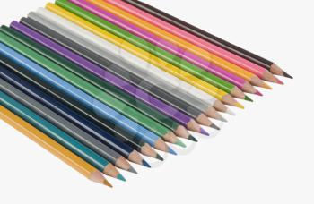 Close-up of colored pencils in a row