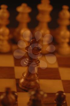 Close-up of chess pieces on a chessboard