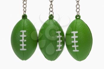 Close-up of American football shaped key rings