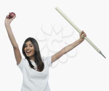 Portrait of a female cricket fan cheering