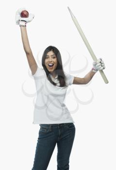 Portrait of a female cricket fan cheering