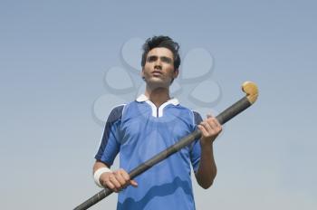 Man holding a hockey stick