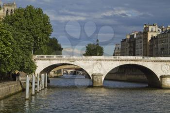 Arch bridge across the river, Pont Au Change, Seine River, Paris, France
