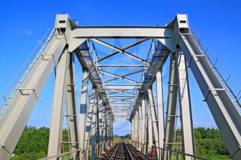 railway bridge through small river