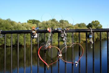 lock on banisters of the bridge