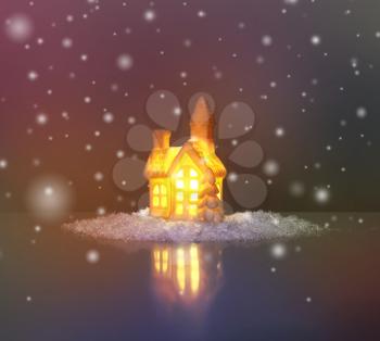 festive light in house with snow