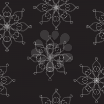 Royalty Free Clipart Image of Snowflakes on a Black Background