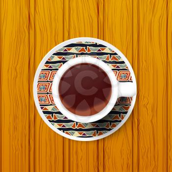 Cup of coffee on a saucer with Tribal pattern. Vector illustration