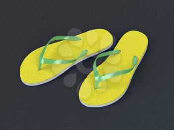 Yellow flip flops on the asphalt