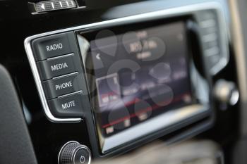The multimedia control buttons in the car