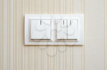 Double wall light switch white color, with indicators.