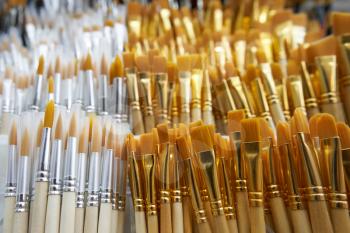 Many brushes for painting in the store on the shelf.