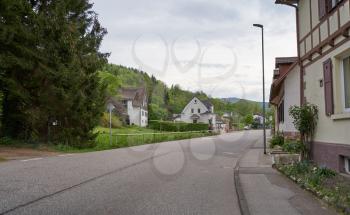 European road through the Schwarzwald forest and German village