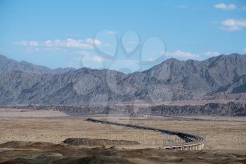Desert and Railway, road construction. Shot in xinjiang, China.